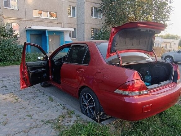 2006 Mitsubishi Lancer IX Рестайлинг, красный, 750000 рублей - вид 4