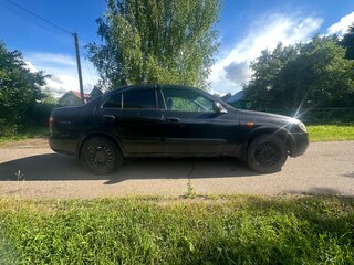 2004 Nissan Almera II (N16) Рестайлинг, чёрный, 290000 рублей, вид 3
