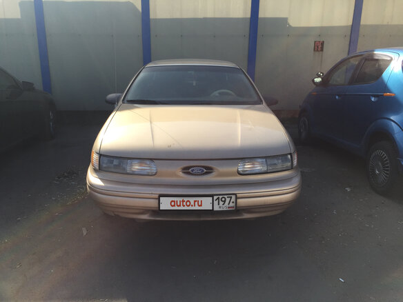 1993 Ford Taurus II, золотистый - вид 1