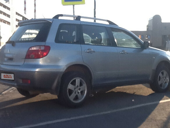 2007 Mitsubishi Outlander I, серебристый - вид 4