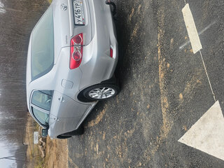 2011 Toyota Corolla X (E140, E150) Рестайлинг, серебристый, 1050000 рублей, вид 5