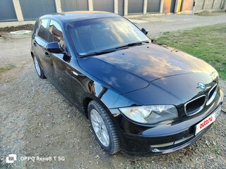 2010 BMW 1 серии 118i I (E81/E82/E87/E88) Рестайлинг, чёрный, 775000 рублей, вид 2