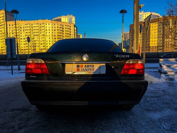 1998 BMW 7 серии 735i III (E38) Рестайлинг, зелёный - вид 4
