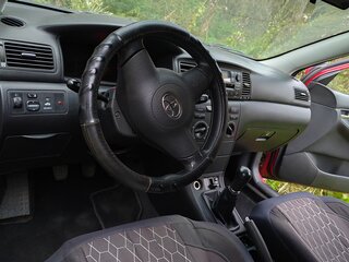 2004 Toyota Corolla IX (E120, E130) Рестайлинг, красный, 550000 рублей, вид 5