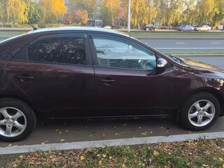 2009 Kia Cerato 5-speed II, пурпурный, 620000 рублей, вид 5