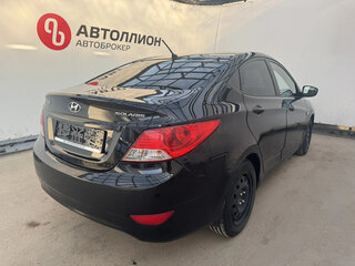2012 Hyundai Solaris I, чёрный, 573550 рублей, вид 5