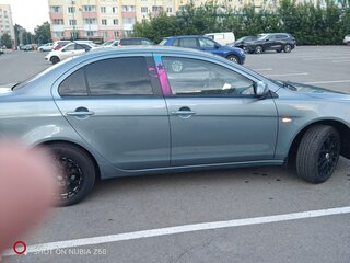 2009 Mitsubishi Lancer X, серый, 630000 рублей, вид 4