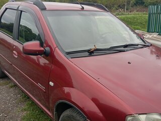 2009 Renault Logan I, красный, 335000 рублей, вид 2