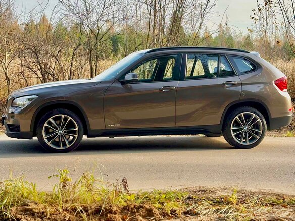 2013 BMW X1 20i I (E84) Рестайлинг, коричневый, 1495000 рублей - вид 3
