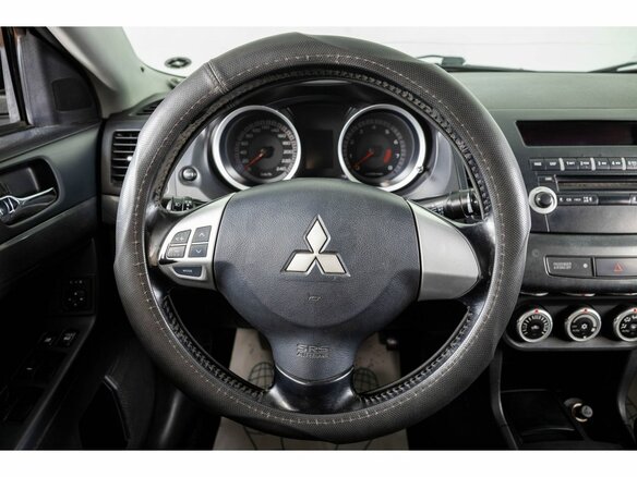 2007 Mitsubishi Lancer X, чёрный - вид 13