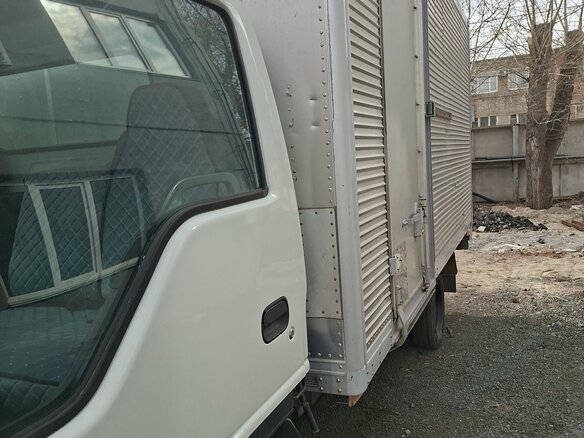 1999 Isuzu Elf (N-series), белый, 980000 рублей - вид 1