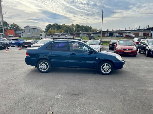 2009 Mitsubishi Lancer Classic IX Рестайлинг, синий, 435000 рублей - вид 3