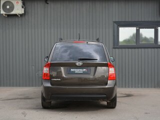 2010 Kia Carens II (UN), коричневый, 729999 рублей, вид 5