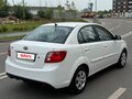 2011 Kia Rio II Рестайлинг, белый - вид 4