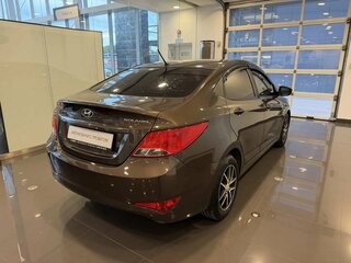 2014 Hyundai Solaris I Рестайлинг, коричневый, 859000 рублей, вид 4