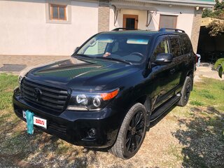 2014 Toyota Land Cruiser 200 Series Рестайлинг 1, чёрный, 4750000 рублей, вид 2