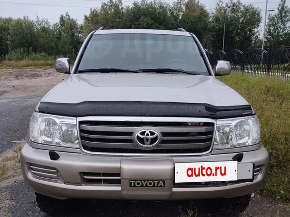 2004 Toyota Land Cruiser 105 100 Series Рестайлинг 1, серебристый - вид 2