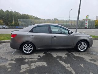 2012 Kia Cerato 6-speed II, серебристый, 901000 рублей, вид 2