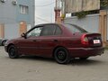 2011 Hyundai Accent ТагАЗ II, пурпурный, 430000 рублей - вид 8