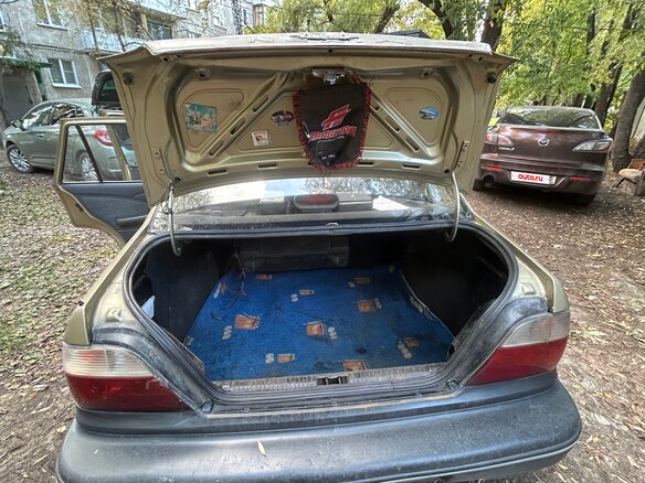 2005 Daewoo Nexia I, коричневый - вид 7