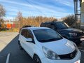 2013 Nissan Note I Рестайлинг, белый - вид 2