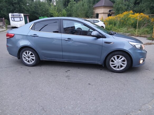 2015 Kia Rio III Рестайлинг, голубой - вид 2