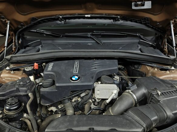 2013 BMW X1 20i I (E84) Рестайлинг, коричневый, 1345000 рублей - вид 9