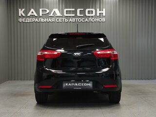 2013 Kia Rio 5-speed III, чёрный, 670000 рублей, вид 4