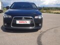 2012 Mitsubishi Lancer X Рестайлинг, чёрный, 1050000 рублей - вид 3