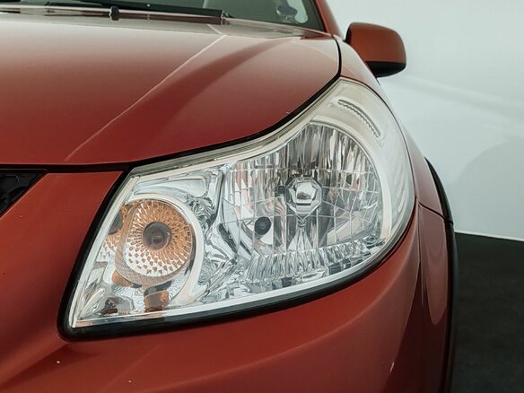 2010 Suzuki SX4 I (Classic) Рестайлинг, оранжевый, 750000 рублей - вид 21