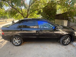 2003 Toyota Corolla IX (E120, E130), чёрный, 385000 рублей, вид 4