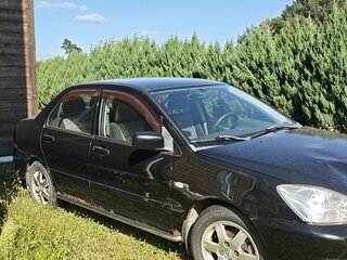 2006 Mitsubishi Lancer IX Рестайлинг, чёрный, 320000 рублей, вид 3