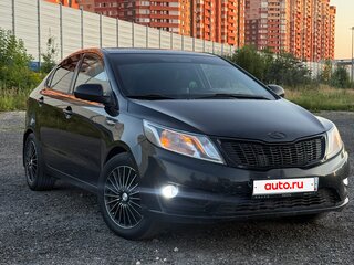2013 Kia Rio 5-speed III, чёрный, 530000 рублей, вид 1