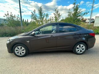 2015 Hyundai Solaris I Рестайлинг, коричневый, 900000 рублей, вид 4