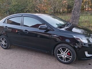2012 Kia Rio 5-speed III, чёрный, 670000 рублей, вид 2