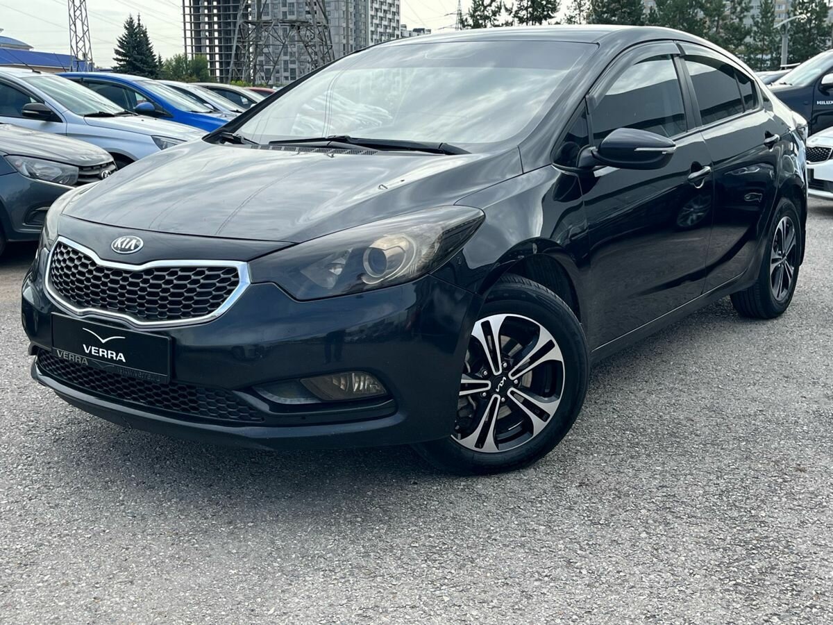 Открыть фотографии: Kia Cerato III