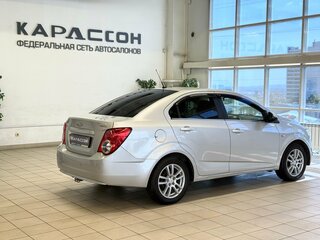 2012 Chevrolet Aveo II, серебристый, 560000 рублей, вид 2