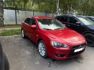 2008 Mitsubishi Lancer X, красный, 650000 рублей, вид 2