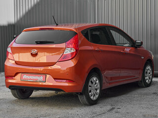 2015 Hyundai Solaris I Рестайлинг, оранжевый, 1140000 рублей, вид 4