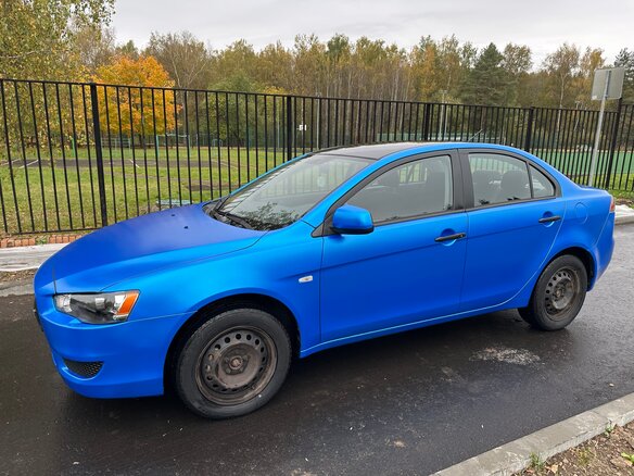 2010 Mitsubishi Lancer X, синий - вид 8