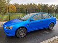 2010 Mitsubishi Lancer X, синий - вид 8