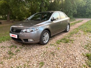 2012 Kia Cerato 6-speed II, серебристый, 1400000 рублей, вид 2