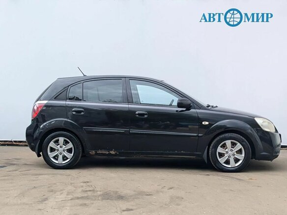 2011 Kia Rio II Рестайлинг, чёрный - вид 3