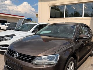 2012 Volkswagen Jetta VI, коричневый, 855000 рублей, вид 1
