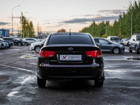 2011 Kia Cerato 6-speed II, красный, 525000 рублей, вид 4
