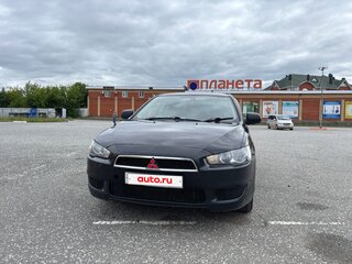 2009 Mitsubishi Lancer X, чёрный, 650000 рублей, вид 2