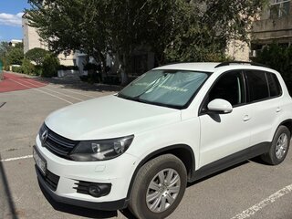 2014 Volkswagen Tiguan I Рестайлинг, белый, 1100000 рублей, вид 1