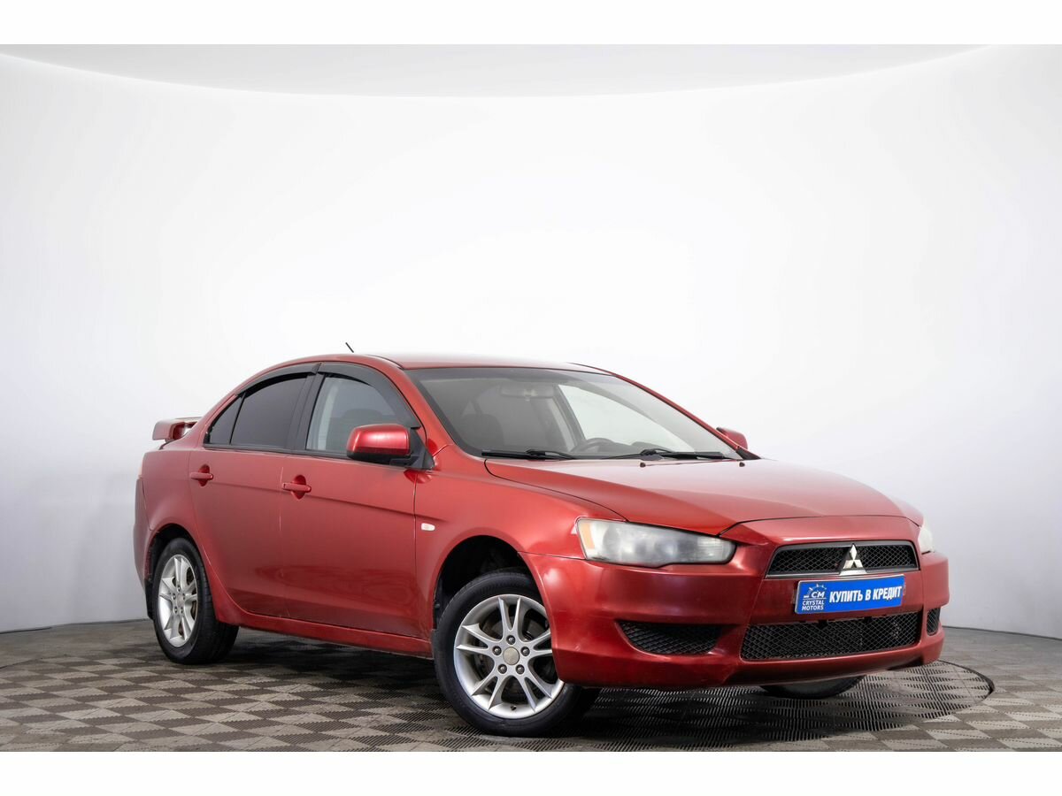 Открыть фотографии: Mitsubishi Lancer X