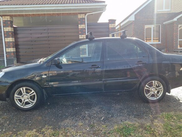 2006 Mitsubishi Lancer IX Рестайлинг, чёрный, 250000 рублей - вид 4