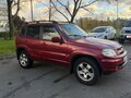 2011 Chevrolet Niva I Рестайлинг, красный - вид 2